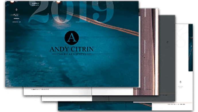 A stack of digital website mockups featuring the Andy Citrin Injury Attorneys logo on a blue-themed homepage, with "2019" faintly visible in the background.